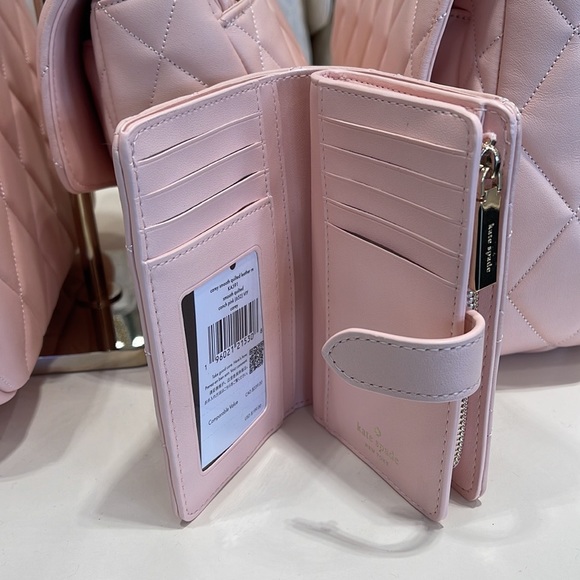 Kate Spade Carey Medium Compartment Bifold Wallet
COLOR: Conch Pink - Picture 11 of 16